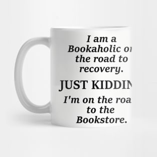 I am a bookaholic on the road to recovery just kidding I'm on the road to the book store Mug